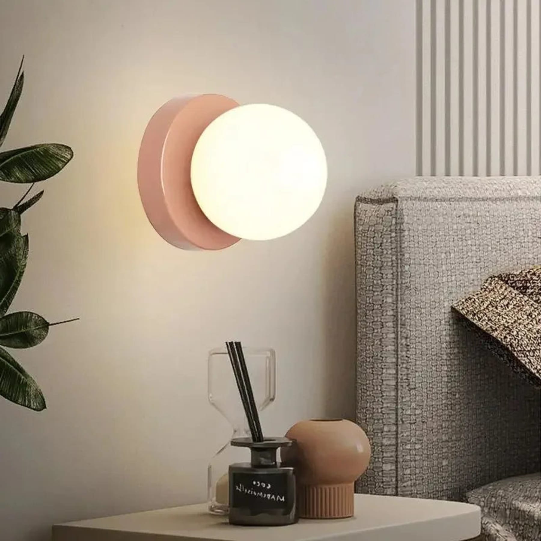 Minimalist Metal Glass Wall Light With Warm White Glow in Pink — Greenwich Home & Living
