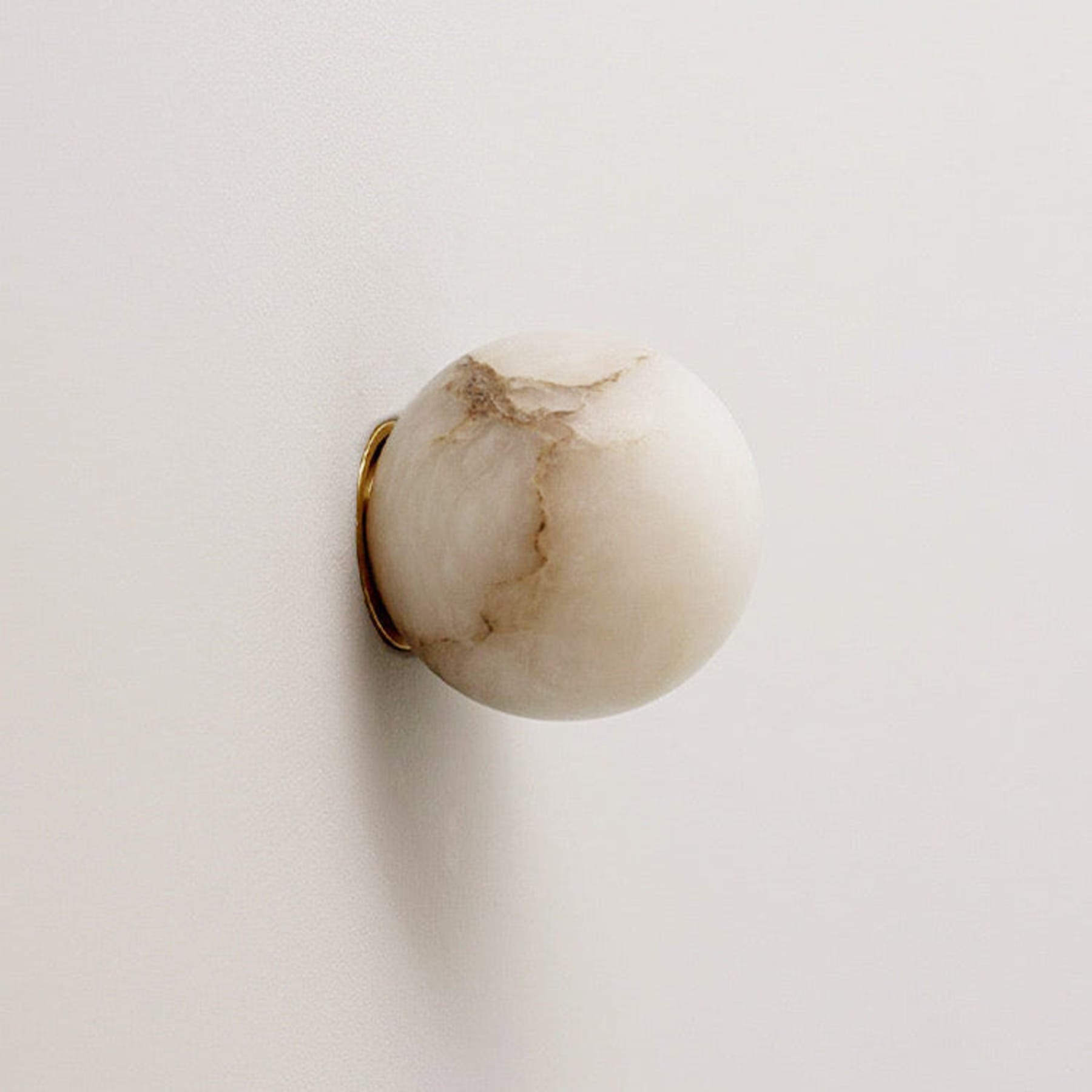 Contemporary Marble Wall Light With Warm Glow — Greenwich Home & Living